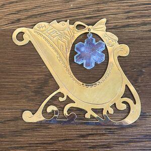 Vtg 1988 Gloria Duchin gold brass Christmas sled ornament with snowflake pendant